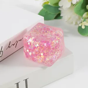 Handcrafted pink glitter water cube squishy toy for stress relief and sensory play