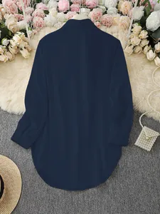 Elegant navy blue long-sleeved women's shirt featuring a simple irregular hemline back view