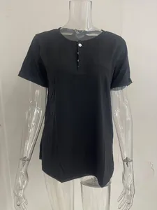 Detailed view of women's black short-sleeve loose T-shirt with Henley neck and pocket