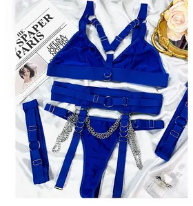 Set lingerie sexy quattro pezzi blu reale con catene metalliche e reggicalze su seta