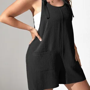 Casual women's black sleeveless romper with tie-up straps and front pockets for summer