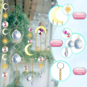 Detail of K9 colorful crystal suncatchers with gold sun and moon metal decorations