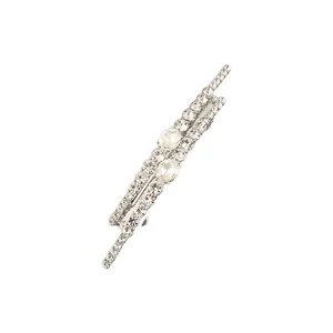 Detailed macro view of a luxury sparkling rhinestone encrusted minimalist hair clip