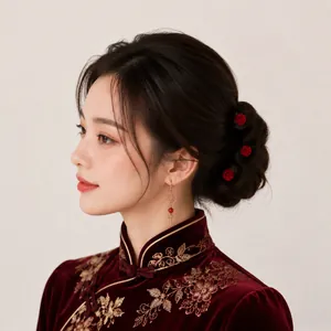 Close-up of elegant red rose U-shaped hairpins for bridal or formal hair styling