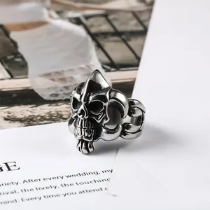 Detailed vintage titanium steel skull ring for men featuring a bold gothic punk style