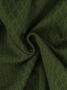 Close-up macro detail of dark green jacquard fabric texture for men's sportswear