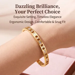 Detailed view of luxury gold-plated stainless steel bangle with inlaid clear zircon stones