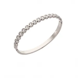 Silver stainless steel bangle bracelet with round cubic zirconia stones and clasp