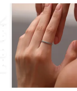 Close-up of vintage S925 sterling silver wheat ear braided ring on finger