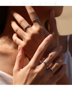 Detail shot of S925 sterling silver vintage wheat ear rings styled on a model's hand.