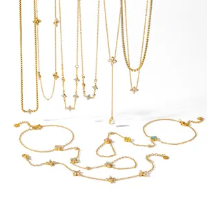 18K gold plated stainless steel jewelry set featuring CZ clover charms and necklaces.
