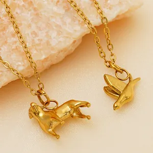 18k gold plated stainless steel necklaces featuring dog and bird charms on rock