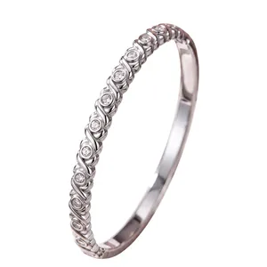 Elegante bracciale rigido in acciaio al titanio con motivo di diamanti per donna