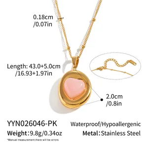 Detail view of waterproof stainless steel necklace with pink quartz heart pendant