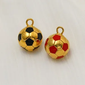 Detailed view of two gold-plated soccer ball pendants for DIY jewelry making accessories.
