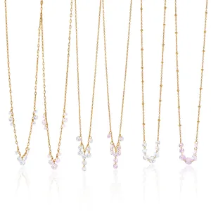 Collection of 18K gold plated stainless steel necklaces with pink and white cubic zirconia tassels
