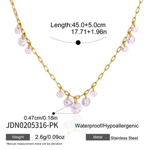 Detail view of 18K gold plated stainless steel necklace with pink zircon tassels