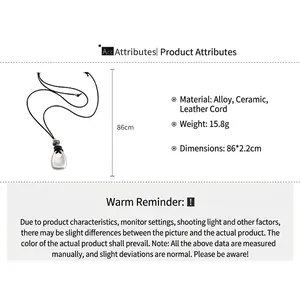 Detail view of long silver pendant necklace with leather cord and product dimensions