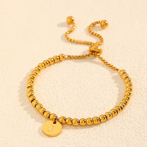 Bracelet en perles d'acier inoxydable doré réglable avec un pendentif disque lettre J