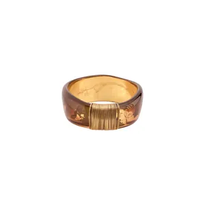 Elegant wide brown resin bangle with gold wire wrapping and floral pattern for women