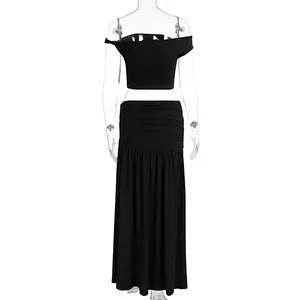 Sexy black two-piece outfit featuring off-shoulder crop top and long ruched maxi skirt