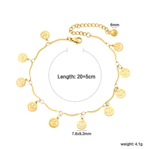 Detailed view of a golden stainless steel smiley face charm anklet with product dimensions