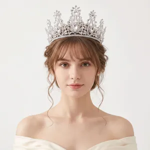 Detailed view of model wearing the Baroque bridal crown with sparkling rhinestones