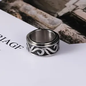 Anello rotante vintage in acciaio al titanio da uomo con motivo a volute retrò