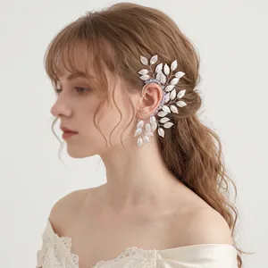 Silver elf ear cuff with crystal leaves shown on model for non-pierced ears