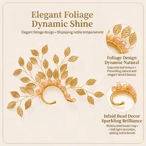 Detailed view of the elegant gold leaf elf ear cuff decorated with pink crystal beads