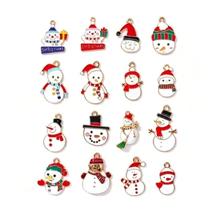 Selezione di 16 ciondoli decorativi in smalto a forma di pupazzo di neve per gioielli fai-da-te