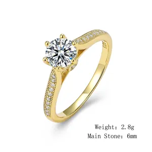 Close-up detail of a classic six-prong gold ring with 6mm main stone and S925 stamp