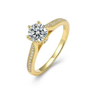 Exquisite close-up of a classic six-prong gold plated sterling silver ring with stones