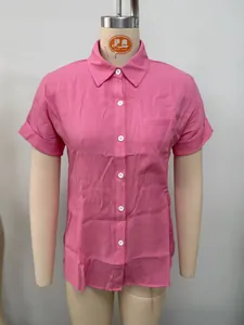 Front view of women's bright pink short sleeve linen button-down shirt on a mannequin