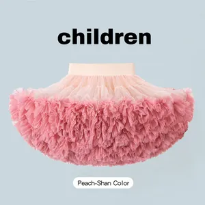 Detail of the voluminous peach pink tulle layers on this stylish girls' tutu skirt.