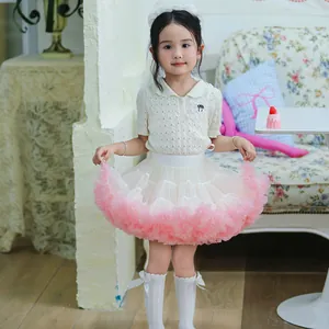 Close-up of girls' pink and white puffy tutu skirt with elegant layered mesh details