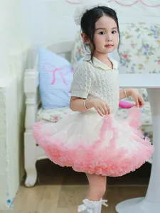 Elegant fluffy pink and white girls' tutu skirt with tiered tulle layers for parties