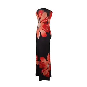 Side view detail of a strapless maxi dress featuring a bold red floral print on black.