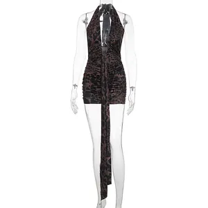 Detailed front view of a sexy deep V-neck leopard print halter mini dress