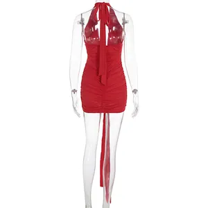 Detail back view of an elegant red ruched halter neck backless mini bodycon dress