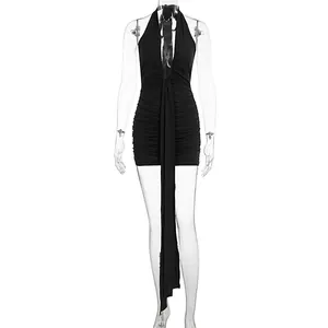 Detail of a sexy deep V-neck halter ruched black mini bodycon dress with long ties.