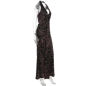 Side view of elegant leopard print halter neck maxi dress with deep V-neck and ruched details