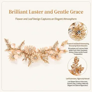 Detailed view of handmade bridal hair comb with gold leaves and clay flowers