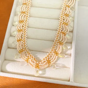 Elegant vintage lace style beaded necklace with glass beads and iridescent teardrop charms