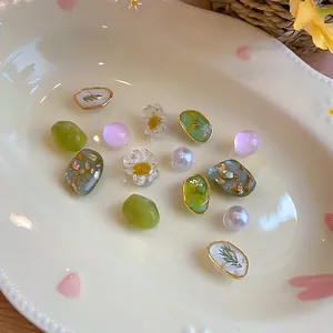Pastel floral and pearl shoe charms for hole shoes on decorative plate