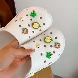 Close-up view of tropical fruit themed shoe charms set for DIY clog decoration accessories