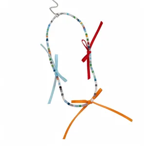 Colorful dopamine style beaded necklace with vibrant silk ribbon bows for summer fashion