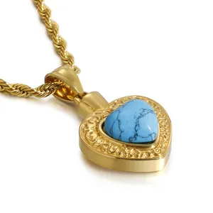 Pendentif cœur vintage en acier inoxydable plaqué or 18 carats avec pierre bleue
