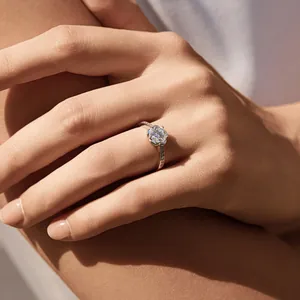 Elegant 1 carat Moissanite solitaire engagement ring in S925 sterling silver on hand