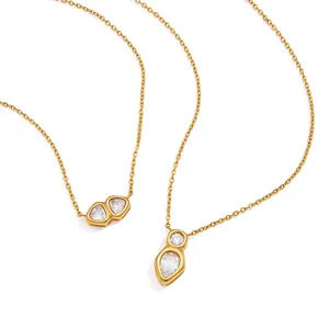 Eleganti collane di lusso in acciaio al titanio dorato con ciondoli in zircone da donna.
